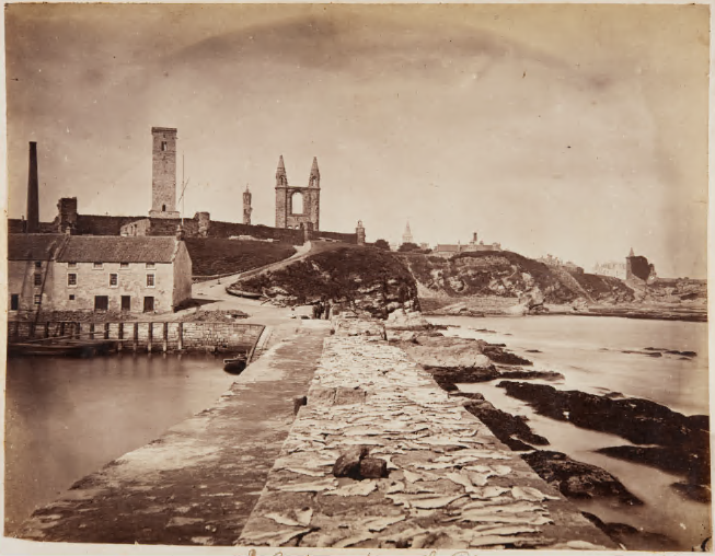 sepia photo of St Andrews harbour from the pier looking up to the harbour and Cathedral
